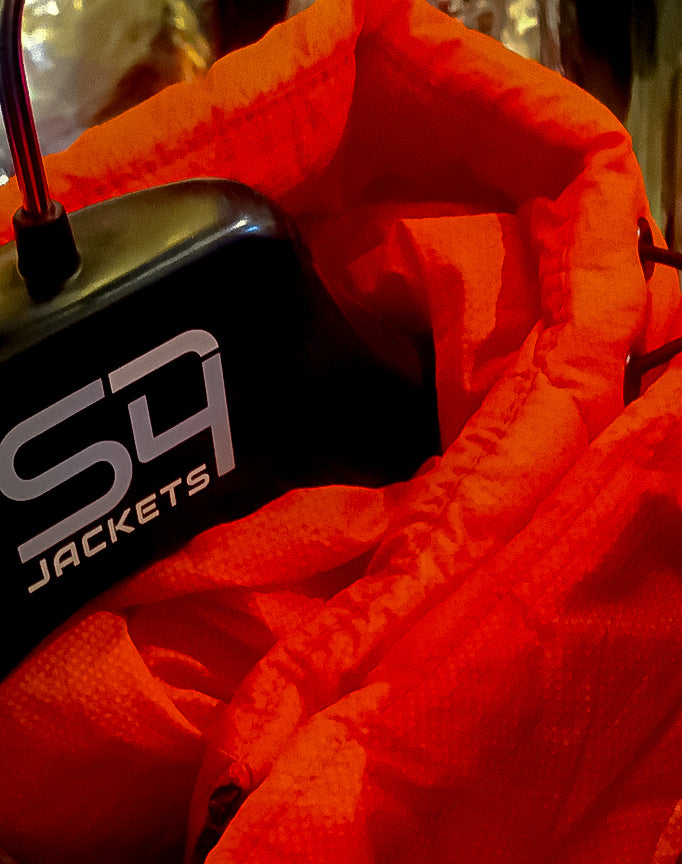 Animal free ANTARKTIKA Coat in Orange.